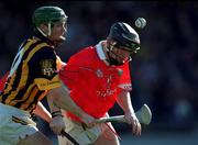 24 February 2001; Wayne Sherlock of Cork under pressure from Kilkenny's Jimmy Coogan during the Allianz National Hurling League Division 1B match between Cork and Kilkenny at Páirc Uí Chaoimh in Cork. Photo by Ray McManus/Sportsfile