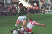 28 April 1993; Roy Keane of Republic of Ireland in action against John Jensen of Denmark during FIFA World Cup Qualifier between Republic of Ireland and Denmark at Lansdowne Road in Dublin. Photo by David Maher/Sportsfile