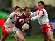 25 February 2001; John Donnellan of Galway under pressure from Ciaran Gourley, left, and Ryan McMenamin of Tyrone during the Allianz National Football League Division 1A match between Galway and Tyrone at Duggan Park in Ballinasloe, Galway. Photo by Ray McManus/Sportsfile
