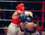 23 February 2001; Liam Cunningham, Saints, Belfast, throws a right towards Darren Campbell, Glin, Dublin, in their flyweight final during the IABA Irish National Boxing Championship Finals at the National Stadium in Dublin. Photo by Damien Eagers/Sportsfile