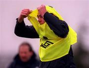26 February 2001; Richard Dunne puts on his training bib  during a Republic of Ireland Training Session at the AUL Complex in Clonshaugh, Dublin. Photo by David Maher/Sportsfile