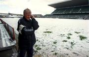 28 February 2001; Denmark manager Morten Olsen speaks on his phone at a snow covered Lansdowne Road in Dublin after it was the announced that the International Friendly match between Republic of Ireland and Denmark game would be postponed. Photo by Brendan Moran/Sportsfile