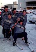 28 February 2001; Warren Tate, from Stillorgan, Dublin assisted by colleagues, Finbarr Hughes from Tyrone, Cormac Maguire from Dublin, Jim Nugent from Armagh and Lorraine Whelan from Wicklow, slips during a &quot;Practice Run&quot; at Dublin Airport prior to their departure, to Alaska, as members of the Special Olympics Ireland Team prepare to compete in the 2001 Special Olympics World Winter Games which commence on the 4th of March. Photo by Ray McManus/Sportsfile
