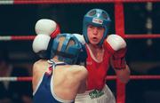 23 February 2001; John Paul Kinsella, St Fergal's, Wicklow, throws a right towards Paul Baker, Pegasus, Down, in their light flyweight final during the IABA Irish National Boxing Championship Finals at the National Stadium in Dublin. Photo by Damien Eagers/Sportsfile