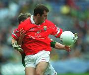 24 September 2000; Mark O'Connor of Cork is tackled by Paul Carey of Mayo during the All Ireland Minor Football Championship Final match between Cork and Mayo at Croke Park in Dublin. Photo by Ray Lohan/Sportsfile