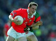 24 September 2000; Conor Brosnan of Cork is tackled by Rory Keane of Mayo during the All Ireland Minor Football Championship Final match between Cork and Mayo at Croke Park in Dublin. Photo by Ray McManus/Sportsfile