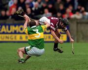 25 February 2001; Athenry's David Donogue in action against Sean Mullan of Dunloy during the AIB All-Ireland Senior Club Hurling Championship Semi-Final match between Athenry and Dunloy at Parnell Park in Dublin. Photo by Ray Lohan/Sportsfile