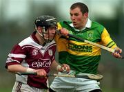 25 February 2001; Eugene Cloonan of Athenry is tackled by Seamus McMullan of Dunloy during the AIB All-Ireland Senior Club Hurling Championship Semi-Final match between Athenry and Dunloy at Parnell Park in Dublin. Photo by Ray Lohan/Sportsfile