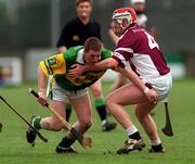 25 February 2001; Gregory Kane of Dunloy is tackled by Paul Hardiman of Athenry during the AIB All-Ireland Senior Club Hurling Championship Semi-Final match between Athenry and Dunloy at Parnell Park in Dublin. Photo by Ray Lohan/Sportsfile