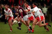 25 February 2001; Kieran Comer of Galway in action against Pascal Canavan of Tyrone during the Allianz National Football League Division 1A match between Galway and Tyrone at Duggan Park in Ballinasloe, Galway. Photo by Ray McManus/Sportsfile