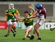 25 February 2001; Liam Redmond of Dunloy blocks down a shot by Brian Hanley of Athenry during the AIB All-Ireland Senior Club Hurling Championship Semi-Final match between Athenry and Dunloy at Parnell Park in Dublin. Photo by Ray Lohan/Sportsfile