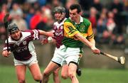 25 February 2001; Sean McIlhatton of Dunloy is tackled by Cathal Moran of Athenry during the AIB All-Ireland Senior Club Hurling Championship Semi-Final match between Athenry and Dunloy at Parnell Park in Dublin. Photo by Ray Lohan/Sportsfile