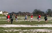 3 March 2001; Dublin based players from the Shamrock Rovers U16 and U14 squads during a training session at Dooder Valley Park in Dublin as all sporting events in Ireland have been postponed as a precautionary measure against Foot and Mouth disease. Photo by Damien Eagers/Sportsfile