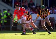 24 February 2001; Seán Óg Ó hAilpín of Cork in action against Jimmy Coogan of Kilkenny during the Allianz National Hurling League Division 1B match between Cork and Kilkenny at Páirc Uí Chaoimh in Cork. Photo by Ray McManus/Sportsfile