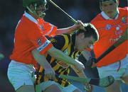 24 February 2001; Tom Drennan of Kilkenny in action against Pat Mulcahy of Cork during the Allianz National Hurling League Division 1B match between Cork and Kilkenny at Páirc Uí Chaoimh in Cork. Photo by Ray McManus/Sportsfile