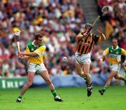 10 September 2000; Offaly's Kevin Martin in action against Denis Byrne of Kilkenny during the Guinness All-Ireland Senior Hurling Championship Final between Kilkenny and Offaly at Croke Park in Dublin. Photo by Ray McManus/Sportsfile