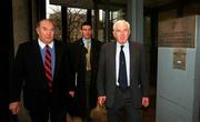 6 March 2001; IRFU President Eddie Coleman, accompanied by Philip Browne, IRFU Chief Executive, centre, and John Lyons, Honorary Secretary of the IRFU, leave the Department of Agriculture and Food in Dublin following a meeting with officials in relation to the postponement of the Six Nations match between Ireland and England which was due to be played at Lansdowne Road on Saturday, 24th March. Photo by Matt Browne/Sportsfile