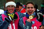 9 March 2001; Ireland's Warren Tate from Stillorgan, Dublin, and Lorraine Whelan from Delgany, Wicklow, celebrate their Gold and Silver Medals won in their Divisions of the Novice Giant Slalom Finals during the 2001 Special Olympics World Winter Games at the Alyeska Ski Resort, Anchorage, Alaska, USA. Photo by Ray McManus/Sportsfile