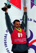 9 March 2001; Ireland's Cormac Maguire, from Ballinteer, Dublin, celebrates his Silver Medal in Division M07 of the Novice Giant Slalom Final during the 2001 Special Olympics World Winter Games at the Alyeska Ski Resort in Anchorage, Alaska, USA. Photo by Ray McManus/Sportsfile