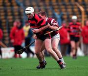 28 November 1999; Fergal Hartley of Ballygunner is tackled by James O'Connor of St Joseph's Doora-Barefield during the AIB Munster Senior Club Hurling Championship Final match between Ballygunner and St. Joseph's Doora-Barefield at Semple Stadium in Thurles, Tipperary. Photo by Ray McManus/Sportsfile