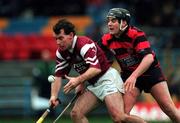 28 November 1999; Ger Oakley of St. Joseph's Doora-Barefield is tackled by Darragh O'Sullivan of Ballygunner during the AIB Munster Senior Club Hurling Championship Final match between Ballygunner and St. Joseph's Doora-Barefield at Semple Stadium in Thurles, Tipperary. Photo by Ray McManus/Sportsfile