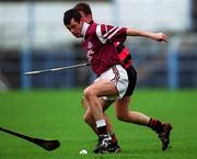 28 November 1999; Greg Baker of St. Joseph's Doora-Barefield is tackled by Niall O'Donnell of Ballygunner during the AIB Munster Senior Club Hurling Championship Final match between Ballygunner and St. Joseph's Doora-Barefield at Semple Stadium in Thurles, Tipperary. Photo by Ray McManus/Sportsfile