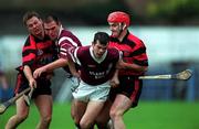 28 November 1999; Ciaran O'Neill, left, and Greg Baker of St. Joseph's Doora-Barefield in action against Niall O'Donnell and Stephen Frampton of Ballygunner during the AIB Munster Senior Club Hurling Championship Final match between Ballygunner and St. Joseph's Doora-Barefield at Semple Stadium in Thurles, Tipperary. Photo by Ray McManus/Sportsfile