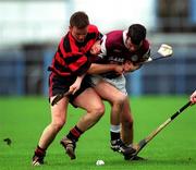 28 November 1999; Ger Baker of St. Joseph's Doora-Barefield is takeled by Niall O'Donnell of Ballygunner during the AIB Munster Senior Club Hurling Championship Final match between Ballygunner and St. Joseph's Doora-Barefield at Semple Stadium in Thurles, Tipperary. Photo by Ray McManus/Sportsfile