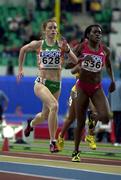 9 March 2001; Ireland's Karen Shinkins (628) leads Canada's Antoine LaDonna in their heat of the Women's 400m during the World Indoor Athletics Championships at the Athletic Pavillion in Lisbon, Portugal. Photo by Brendan Moran/Sportsfile