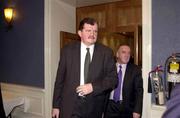 9 March 2001; Bernard O'Byrne, FAI Chief Executive, and Pat Quigley, FAI President, right, leave a FAI Senior Council Meeting at the Green Isle Hotel in Dublin, where it had been agreed to scrap eircom Park, in favour of the Government's Stadium Ireland. Photo by David Maher/Sportsfile