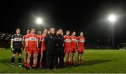 23 January 2016; Derry manager, Damian Barton and assistant manager, Tony Scullion join the team during the national anthem ahead of the game. Bank of Ireland Dr McKenna Cup Final, Tyrone v Derry, Athletic Grounds, Armagh. Picture credit: Oliver McVeigh / SPORTSFILE