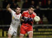 23 January 2016; Cailean O'Boyle, Derry, in action against Ronan McNamee, Tyrone. Bank of Ireland Dr McKenna Cup Final, Tyrone v Derry, Athletic Grounds, Armagh. Picture credit: Oliver McVeigh / SPORTSFILE