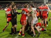 23 January 2016;  Tyrone and Derry players tussle near the end of the game. Bank of Ireland Dr McKenna Cup Final, Tyrone v Derry, Athletic Grounds, Armagh. Picture credit: Oliver McVeigh / SPORTSFILE