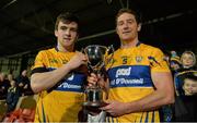 23 January 2016; Clare joint captains Tony Kelly, left, and Cian Dillon lift the Munster Senior Hurlign League trophy after the game. Munster Senior Hurling League Final, Limerick v Clare, Gaelic Grounds, Limerick. Picture credit: Brendan Moran / SPORTSFILE