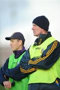 22 March 2009; Cathal O'Bric, Wolfe Tones Manager, left and Damien Sheridan, Senechalstown, look on during the last moments of the game. Meath County Senior Football Final, Wolfe Tones v Senechalstown, Páirc Tailteann, Navan. Picture credit: Ray Lohan / SPORTSFILE