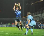 31 October 2009; Girvan Dempsey, Leinster, gathers a ball ahead of Richard Mustoe, Cardiff Blues. Celtic League, Leinster v Cardiff Blues, RDS, Dublin. Picture credit: Brendan Moran / SPORTSFILE