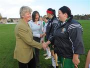 31 October 2009; President of the Camogie Association Joan O'Flynn, left, and Women's Camanachd President Karen Cameron greet the players before the start of the game. Camogie/Shinty International, Scotland v Ireland, Bught Park, Inverness, Scotland. Photo by Sportsfile