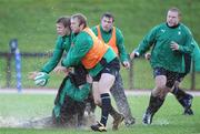 4 November 2009; Wing Andrew Trimble is tackled by Stephen Ferris during Ireland rugby squad training. University of Limerick, Limerick. Picture credit: Brendan Moran / SPORTSFILE