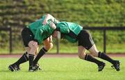 4 November 2009; Lock Paul O'Connell, right, pushes against fellow locks Donnacha Ryan and Devin Toner at scrummage practice during Ireland rugby squad training. University of Limerick, Limerick. Picture credit: Brendan Moran / SPORTSFILE