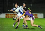 5 November 2009; Ciaran Macken, Senechalstown, in action against Eoghan Harrington, Wolfe Tones. Meath County Senior Football Final Replay, Wolfe Tones v Senechalstown, Pairc Tailteann, Navan, Co. Meath. Photo by Sportsfile