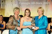 7 November 2009; Briege Corkery, of Cork, is presented with her Camogie All-Star award by Joan O'Flynn, President of the Camogie Association, and Mary Hanafin T.D., Minister for Social and Family Affairs, during the 2009 Camogie All-Stars Awards, in association with O'Neills. Citywest Hotel, Conference, Leisure & Golf Resort, Dublin. Picture credit: Pat Murphy / SPORTSFILE