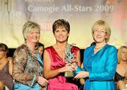 7 November 2009; Geraldine O'Connor collects the Camogie All-Star award on behalf of her daughter Genna O'Connor, from Joan O'Flynn, President of the Camogie Association, and Mary Hanafin T.D., Minister for Social and Family Affairs, during the 2009 Camogie All-Stars Awards, in association with O'Neills. Citywest Hotel, Conference, Leisure & Golf Resort, Dublin. Picture credit: Pat Murphy / SPORTSFILE