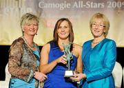 7 November 2009; Aoife Murray, of Cork, is presented with her Camogie All-Star award by Joan O'Flynn, President of the Camogie Association, and Mary Hanafin T.D., Minister for Social and Family Affairs, during the 2009 Camogie All-Stars Awards, in association with O'Neills. Citywest Hotel, Conference, Leisure & Golf Resort, Dublin. Picture credit: Pat Murphy / SPORTSFILE