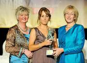 7 November 2009; Regina Flynn, of Cork, is presented with her Camogie All-Star award by Joan O'Flynn, President of the Camogie Association, and Mary Hanafin T.D., Minister for Social and Family Affairs, during the 2009 Camogie All-Stars Awards, in association with O'Neills. Citywest Hotel, Conference, Leisure & Golf Resort, Dublin. Picture credit: Pat Murphy / SPORTSFILE