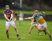 24 January 2016; Shane Tompkins, Wexford, in action against Sean Ryan, Offaly. Bord na Mona Walsh Cup, Semi-Final, Wexford v Offaly, Kennedy Park, New Ross, Co. Wexford. Picture credit: Sam Barnes / SPORTSFILE