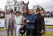 24 January 2016; Douvan with, from left, owner Rich Ricci, jockey Ruby Walsh, groom Gayle Carlisle and trainer Willie Mullins after winning the Frank Ward Solicitors Arkle Novice Steeplechase. Leopardstown Racecourse, Leopardstown, Co. Dublin. Picture credit: Ramsey Cardy / SPORTSFILE