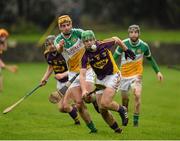 24 January 2016; Aidan Nolan, Wexford, in action against Colin Egan, Offaly. Bord na Mona Walsh Cup, Semi-Final, Wexford v Offaly, Kennedy Park, New Ross, Co. Wexford. Picture credit: Sam Barnes / SPORTSFILE