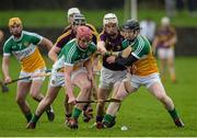 24 January 2016; Cathal Dunbar, Wexford, in action against Conor Doughan, left, and Niall Wayne, Offaly. Bord na Mona Walsh Cup, Semi-Final, Wexford v Offaly, Kennedy Park, New Ross, Co. Wexford. Picture credit: Sam Barnes / SPORTSFILE