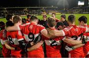23 January 2016; The Derry team huddle along with Damian Barton, manager and Tony Scullion, assistant manager ahead of the game. Bank of Ireland Dr McKenna Cup Final, Tyrone v Derry, Athletic Grounds, Armagh. Picture credit: Oliver McVeigh / SPORTSFILE