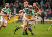 24 January 2016; Shane Dooley, Offaly, in action against Diarmuid O'Keefe, Wexford. Bord na Mona Walsh Cup, Semi-Final, Wexford v Offaly, Kennedy Park, New Ross, Co. Wexford. Picture credit: Sam Barnes / SPORTSFILE